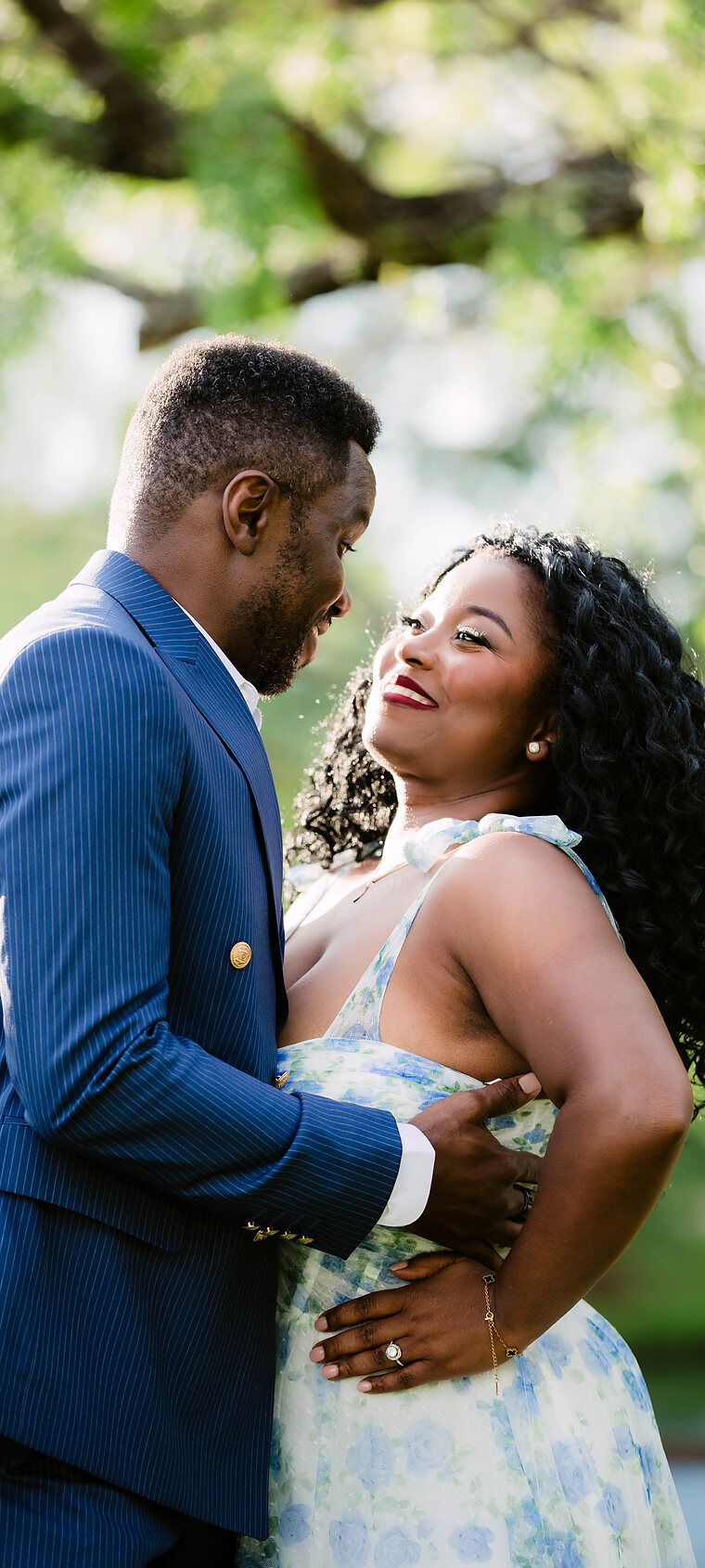 Marie-Louise and Cedric, laughing together at golden hour